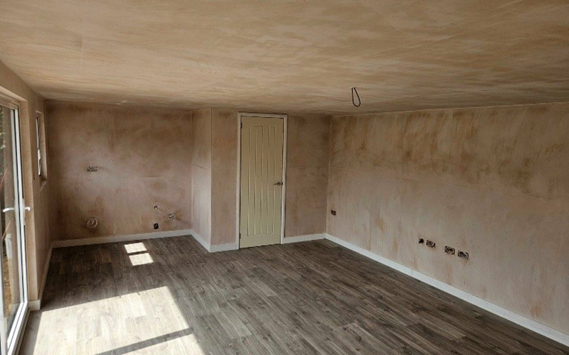 construction site with a large prepared wooden base featuring silver panels for a project related to 10 building ideas